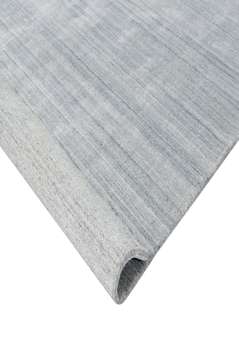 Handloom Undyed Natural Wool Area Rug