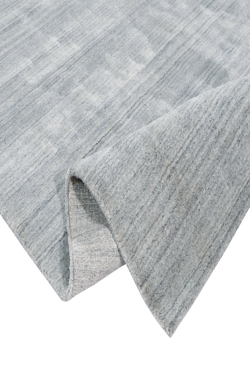 Handloom Undyed Natural Wool Area Rug