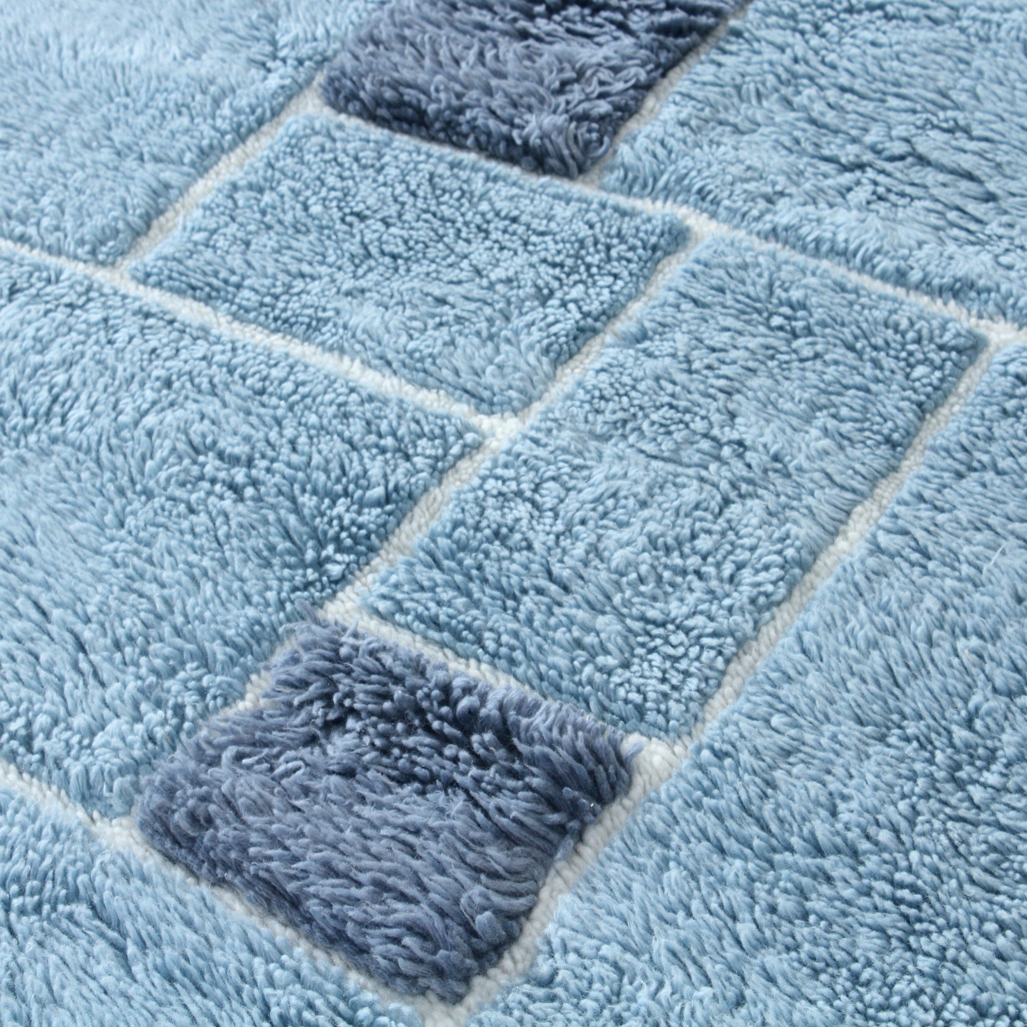 Tuft with Needle Blue Wool Area Rug